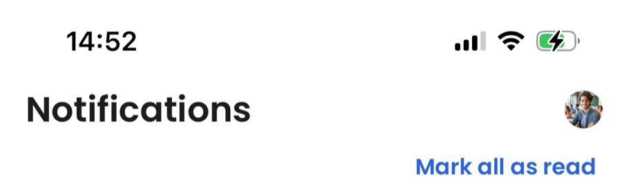 The Mark all as read link at the top of the notifications list